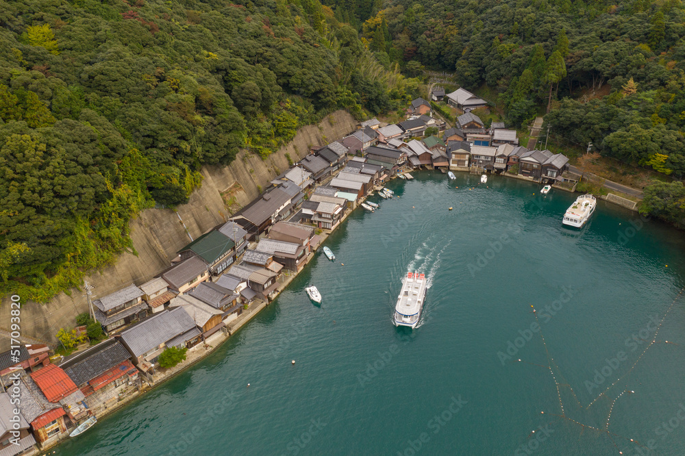 Tour Boat Leaves Port at Funaya Fisherman Houses in Ine-cho Town, Japan