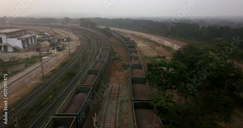 Train Wagons Loaded With Iron Ore At The Coal Terminal Of Paradip Port In India. aerial drone photo