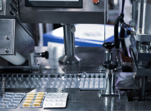 Fotografie, Tablou Capsule blister packing machine in pharmaceutical industry.