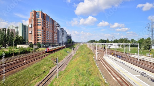 A view of the office buildings and railroad tracks from the footbridge over railway station.