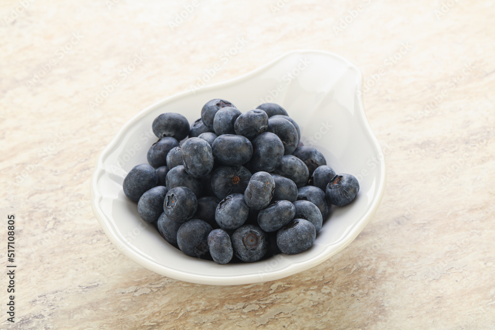 Sweet ripe blueberry heap in the bowl Sweet ripe blueberry heap in the bowl