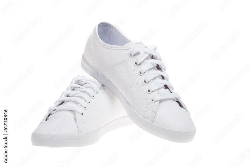 Pair of new white sneakers, isolated on white background Pair of new white sneakers, isolated on white background