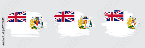 Set of 3 creative brush flag of British Antarctic Territory with grungy stroke effect. Modern brush flags collection.