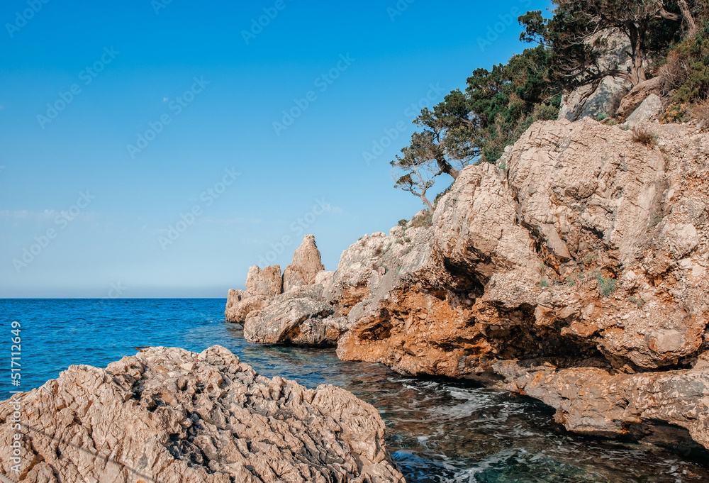 Bizarre granite rock and azure bay in Capo Testa, Sardinia, Italy. Bizarre granite rock and azure bay in Capo Testa, Sardinia, Italy.