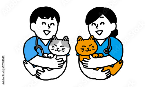 猫を抱っこする獣医師男女
