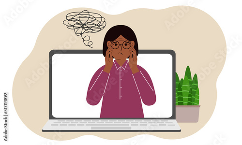 Online consultation with a psychologist. Laptop with a woman with confused thoughts. Psychotherapeutic practice, psychiatric consultation.
