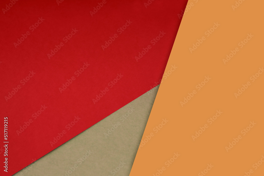 Dark and light, Plain and Textured Shades of red orange brown yellow papers background lines intersecting to form a triangle shape Dark and light, Plain and Textured Shades of red orange brown yellow papers background lines intersecting to form a triangle shape