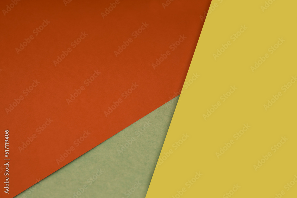 Dark and light, Plain and Textured Shades of red orange yellow brown papers background lines intersecting to form a triangle shape Dark and light, Plain and Textured Shades of red orange yellow brown papers background lines intersecting to form a triangle shape