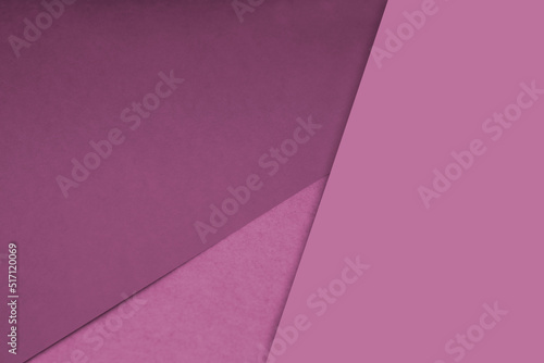 Plain and textured pink sheet paper arrangement background forming a triangle for creative cover designing