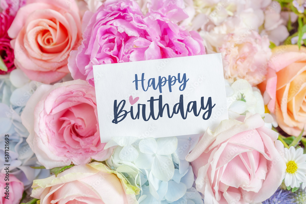 Happy birthday card on blossom flower bouquet background Stock Photo ...