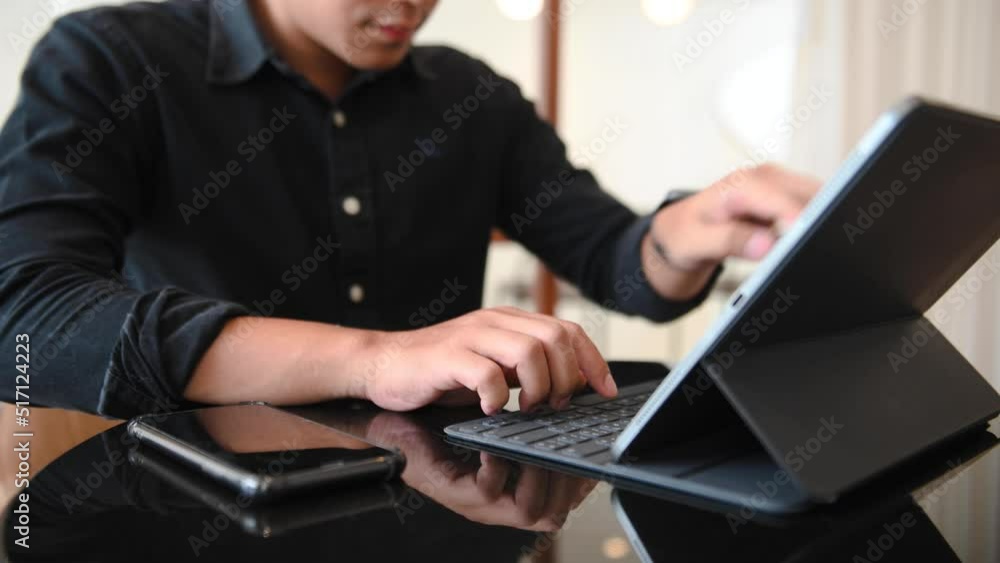 businessman using on tablet and smartphone at home office as concept.businessman hand using on tablet and smartphone at home office as concept. businessman using on tablet and smartphone at home office as concept.businessman hand using on tablet and smartphone at home office as concept.