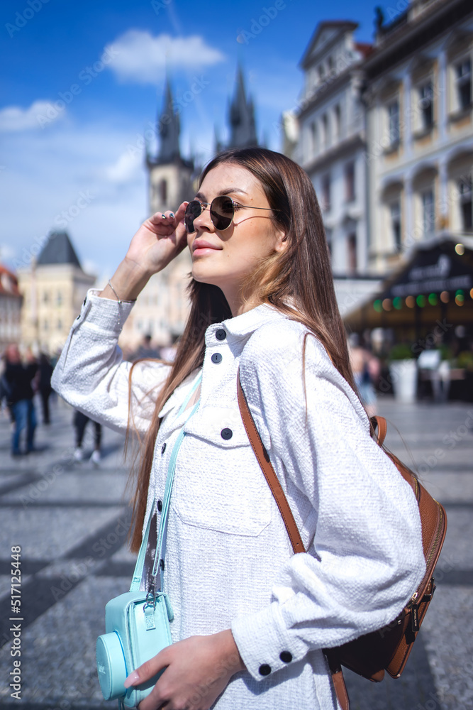 Fototapeta premium Stylish woman standing on street