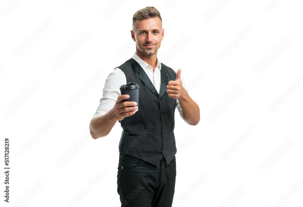 Happy businessman in suit vest giving thumb holding disposable cup with takeaway coffee Happy businessman in suit vest giving thumb holding disposable cup with takeaway coffee