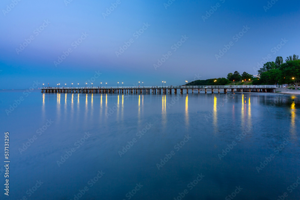 Baltic pier in Gdynia Orlowo at dusk, Poland