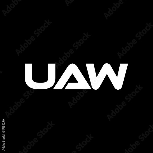 UAW letter logo design with black background in illustrator, vector logo modern alphabet font overlap style. calligraphy designs for logo, Poster, Invitation, etc. photo