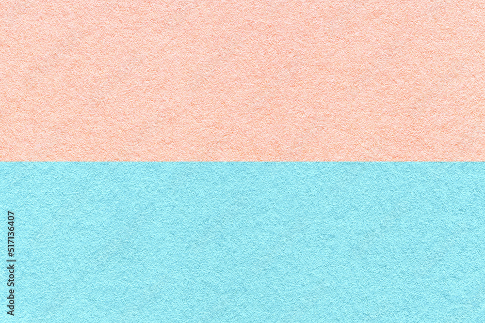 Texture of craft light blue and pink paper background, half two colors, macro. Vintage dense rose cardboard. Texture of craft light blue and pink paper background, half two colors, macro. Vintage dense rose cardboard.