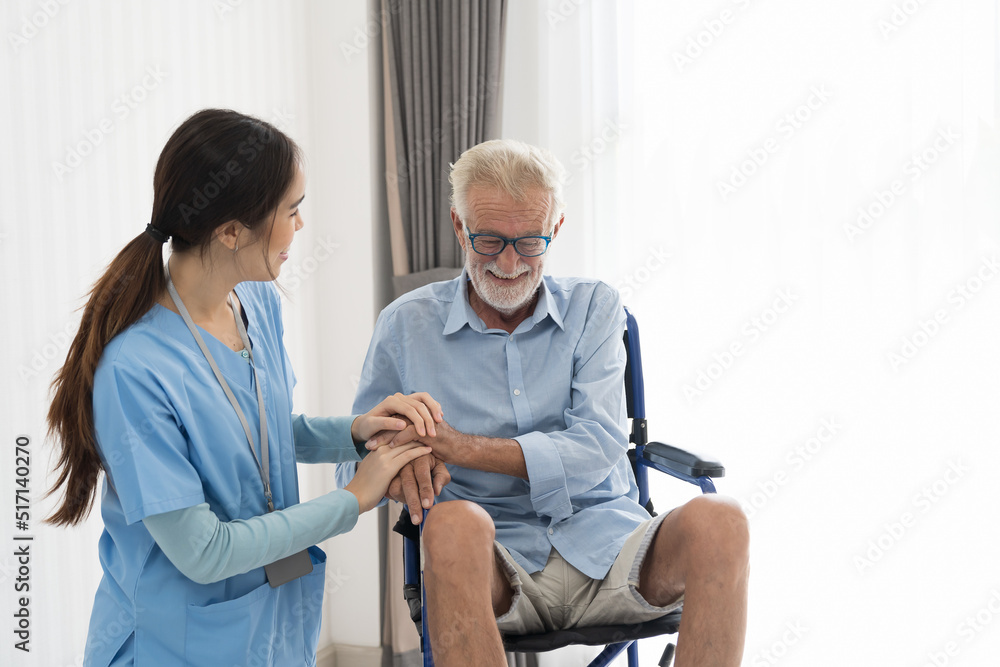 Nurse and patient senior man on wheelchair. Nurse caring senior man sitting on wheelchair at hospital. Asian nurse taking care old man in wheelchair at home. Nurse and patient senior man on wheelchair. Nurse caring senior man sitting on wheelchair at hospital. Asian nurse taking care old man in wheelchair at home.