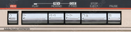 Photos Close up of a retro tape deck buttons, record, play, fast forward, rewind, stop,