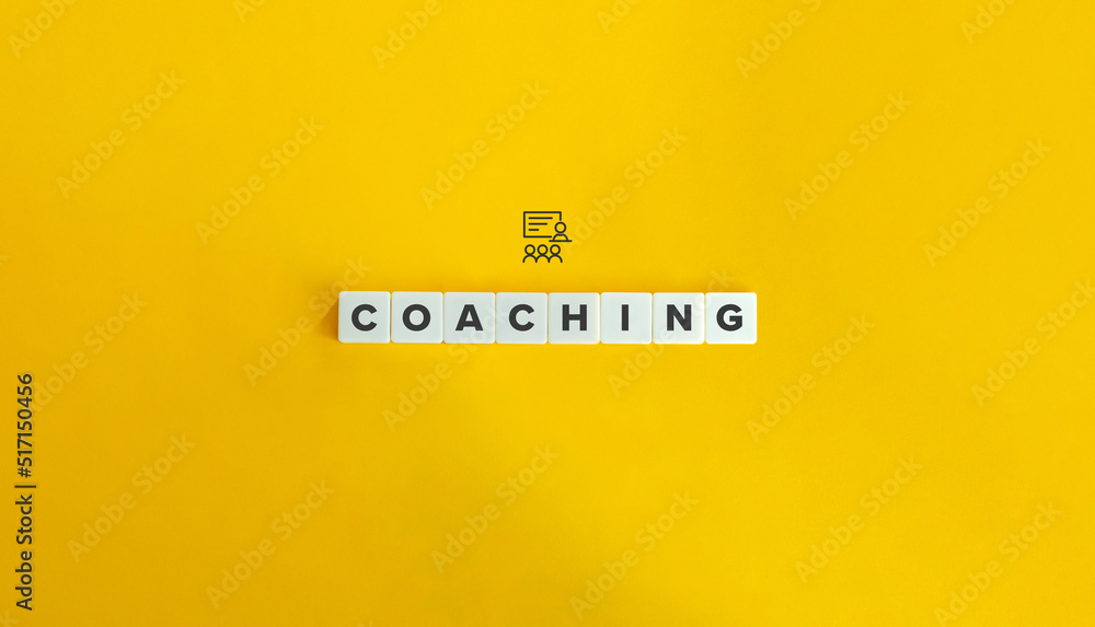 Coaching Banner. Word on Block Letter Tiles on Yellow Background. Minimal Aesthetics. Coaching Banner. Word on Block Letter Tiles on Yellow Background. Minimal Aesthetics.
