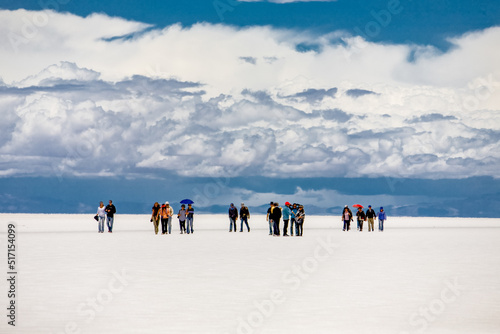 Tourists on worlds largest salt flat Salar de Uyuni, Bolivia. South America nature