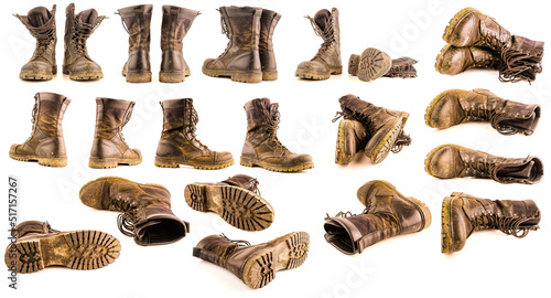 Photography set of dirty military style light ankle boots isolated on white background - fro