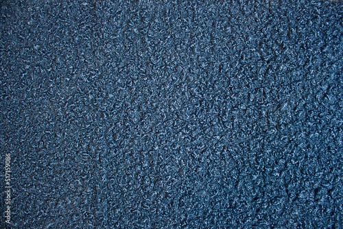blue background with boucle fabric close-up photo