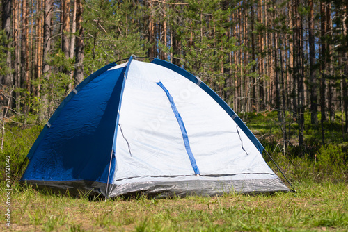 Camping in the forest. Tent in nature close-up