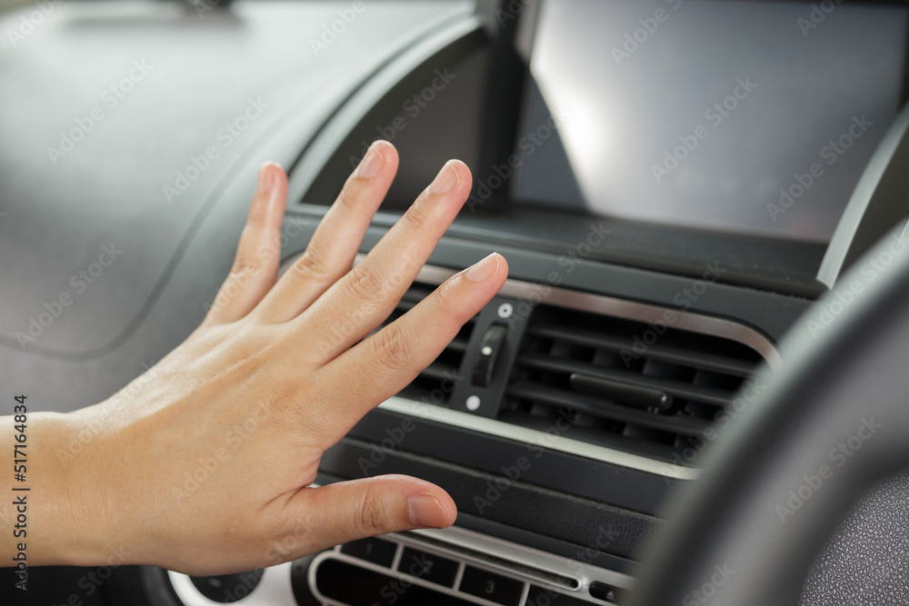 hand checking air conditioner system inside the car hand checking air conditioner system inside the car