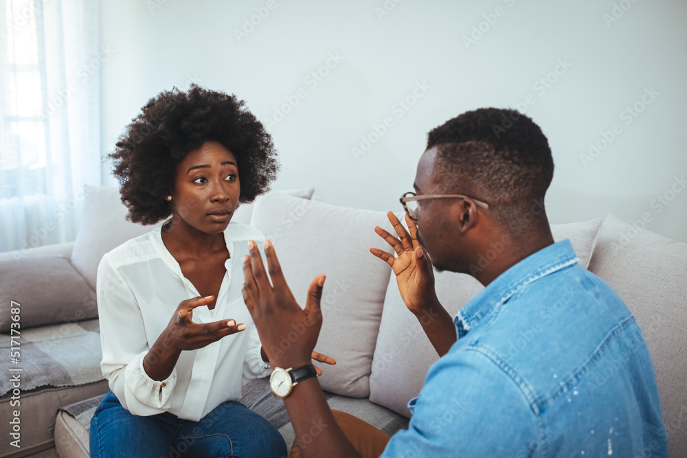 Angry millennial couple arguing shouting blaming each other of problem, frustrated husband and annoyed wife quarreling about bad marriage relationships, unhappy young family fighting at home concept Angry millennial couple arguing shouting blaming each other of problem, frustrated husband and annoyed wife quarreling about bad marriage relationships, unhappy young family fighting at home concept