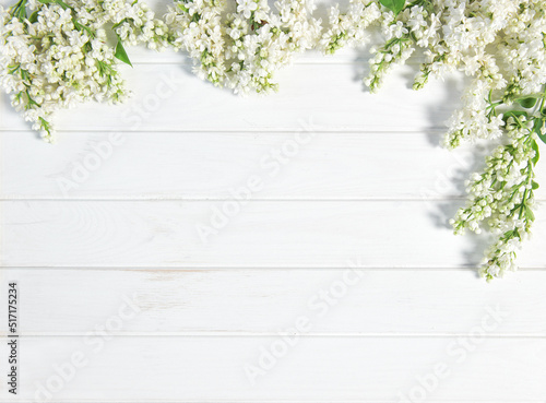White lilac flowers white washed wooden background