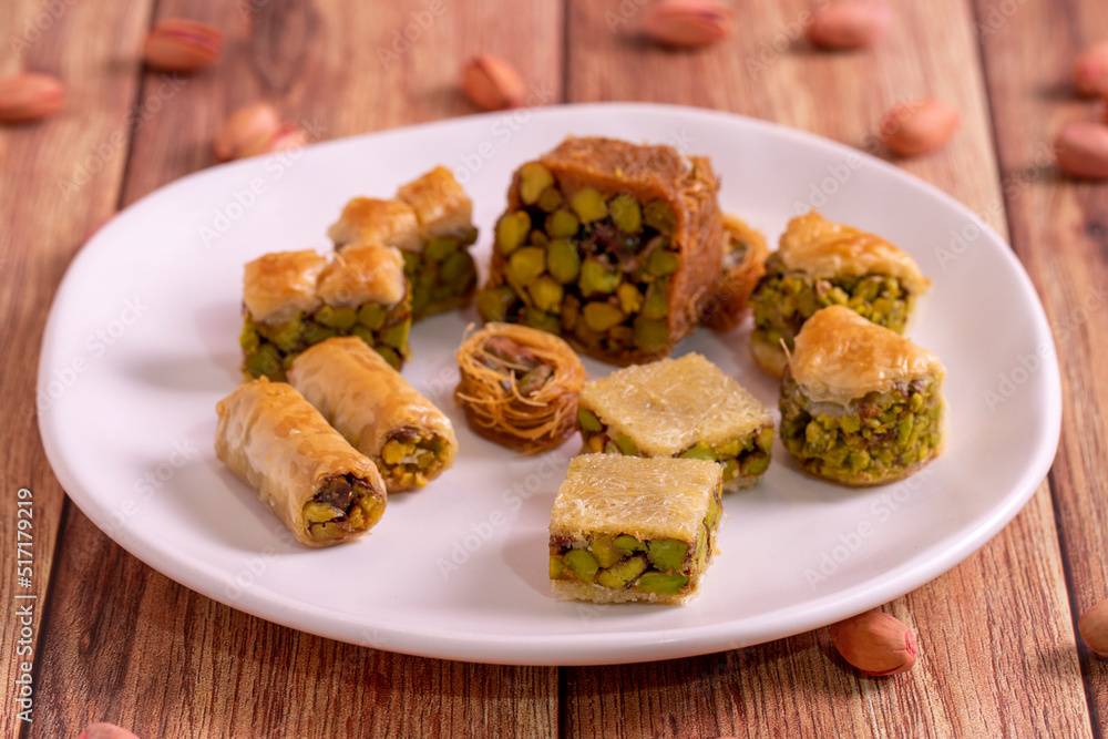 Mix pistachio baklava. Assortment of pistachio baklava on a wooden background. Turkish cuisine desserts. close up
