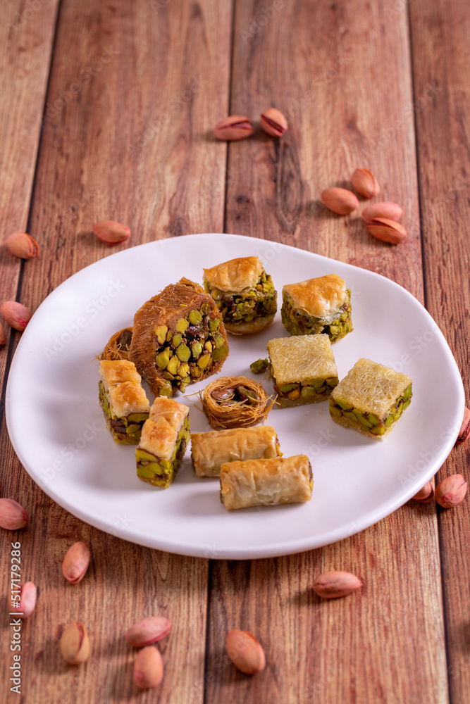 Mix pistachio baklava. Assortment of pistachio baklava on a wooden background. Turkish cuisine desserts. close up