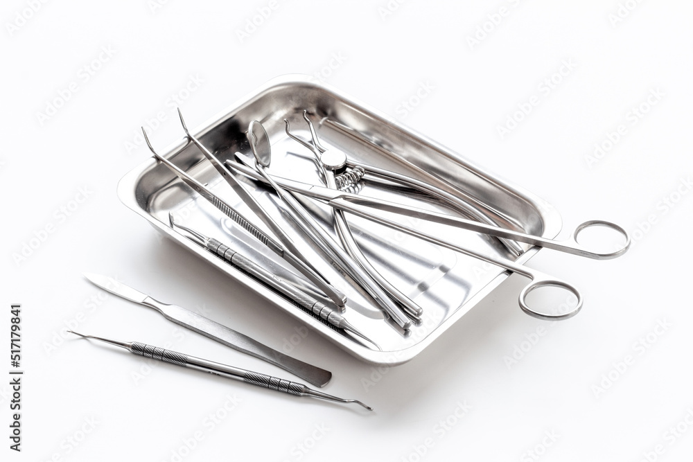 Stainless Steel Medical Components Medical equipment tools instruments in steel tray at doctor desk Stock ...