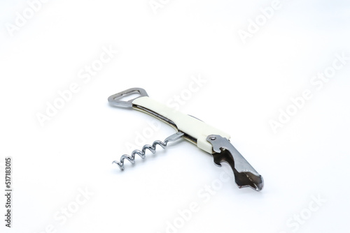 metal multiuse corkscrew with opener steel on white background photo