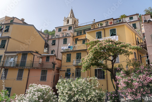 Cinque Terre are five beautiful villages at the coastline of Italy. The villages have colorful houses.