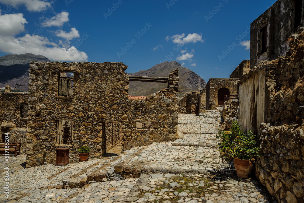 Stone buildings of the monastery against the backdrop of mountains Stone buildings of the monastery against the backdrop of mountains