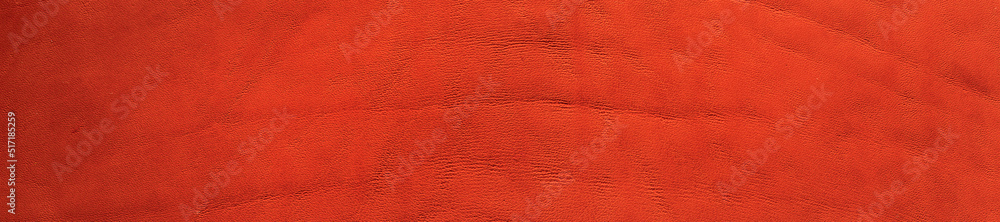 Fototapeta premium Background of red natural leather texture. Panoramic banner