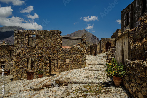 Stone buildings of the monastery against the backdrop of mountains