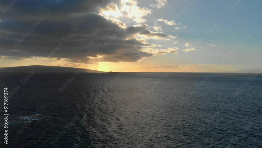 Beautiful relaxing 4k drone shot in Maui looking towards Kaho'olawe island. Sunset in a February sky near Wailea. Tranquil relaxing view of the beautiful Pacific Ocean Beautiful relaxing 4k drone shot in Maui looking towards Kaho'olawe island. Sunset in a February sky near Wailea. Tranquil relaxing view of the beautiful Pacific Ocean
