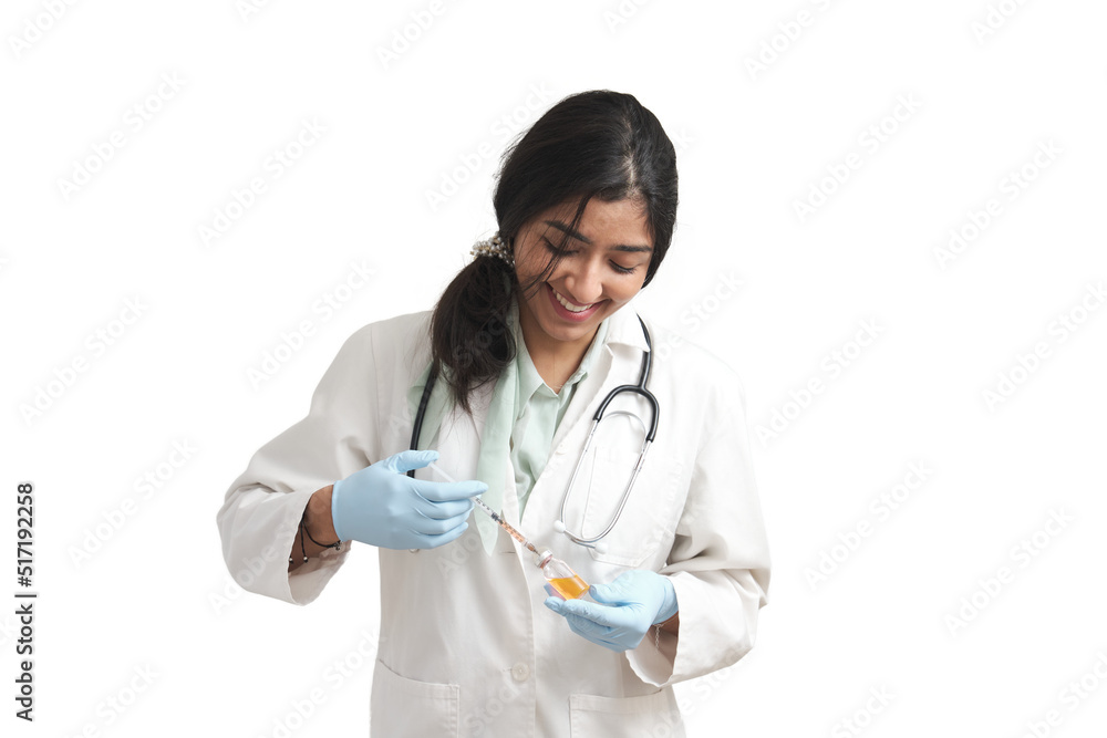 Young Venezuelan female doctor preparing a dose of a vaccine. Isolated over white background. Young Venezuelan female doctor preparing a dose of a vaccine. Isolated over white background.