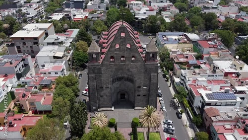 A zoom out shot of St. Augustine Parish church in Polanco, Mexico City. A beautiful view of the church and its surrounding photo