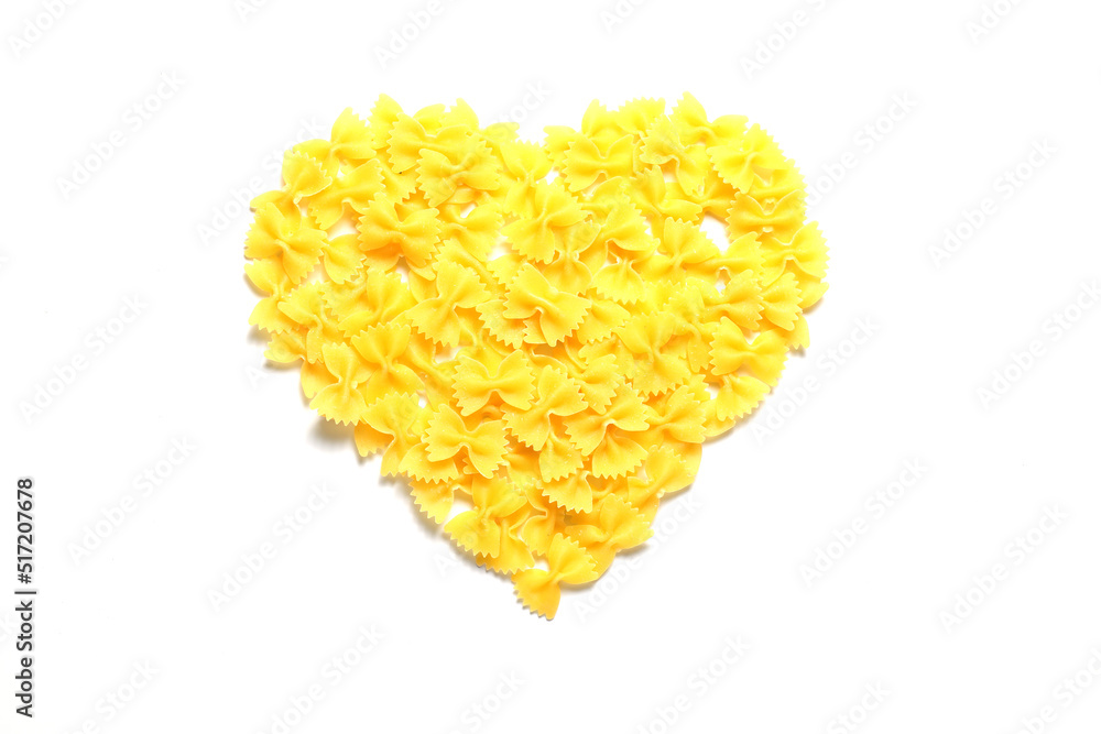 Pasta in the shape of a heart on a white background. Pasta in the shape of a heart on a white background.