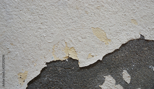 Old wall with cement surface crack. Wall color paint surface  crack. Old cement wall abstract background.