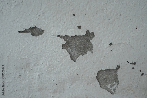 Old wall with cement surface crack. Wall color paint surface  crack. Old cement wall abstract background.