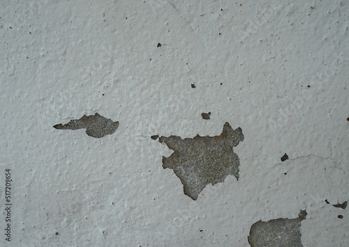Old wall with cement surface crack. Wall color paint surface  crack. Old cement wall abstract background.