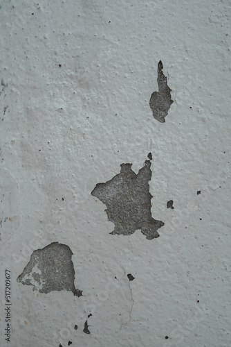 Old wall with cement surface crack. Wall color paint surface  crack. Old cement wall abstract background.