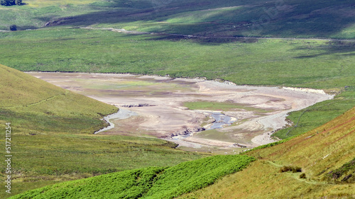 Part of Craig Goch Reservoir, Elan Valley,Wales, UK,during drought July 2022,