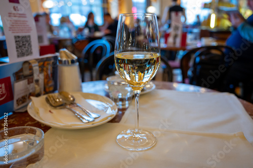 Photography Lifestyle of Vienna, glass of white dry Austrian wine served in old Viennese-sty