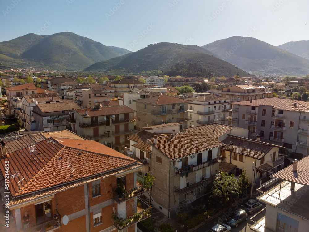 Aerial view on houses and streets of Fondi, town in agricultural valley between Terracina and Sperlonga, Italy