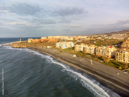 Aerial panoramic view on coastline in Torrox Costa, Costa del Sol, small touristic town between Malaga and Nerja, Andalusia, Spain photo